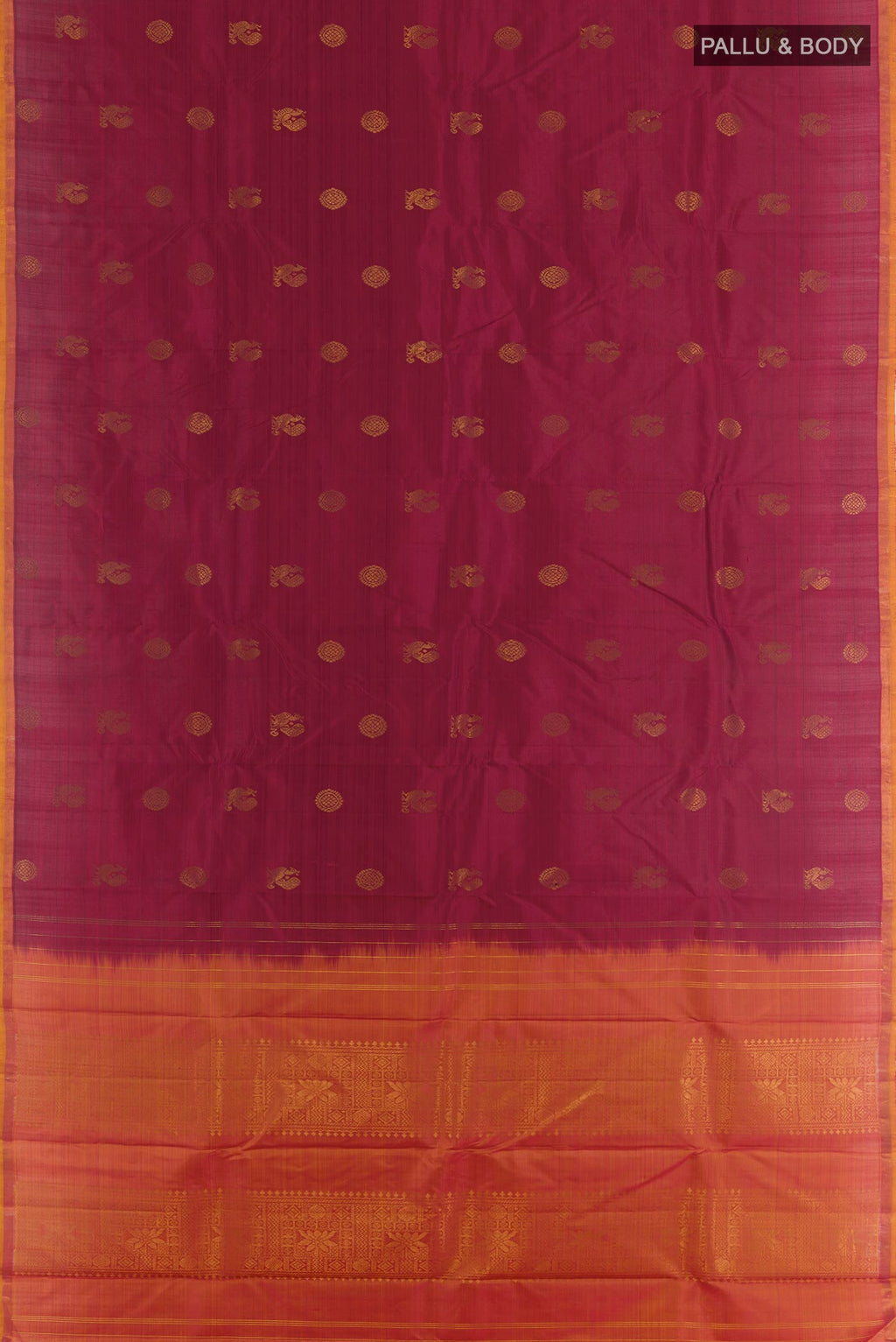 Flat view of Maroon Kanchipuram Silk Saree with Zari Butta on the body and Zari Border. 