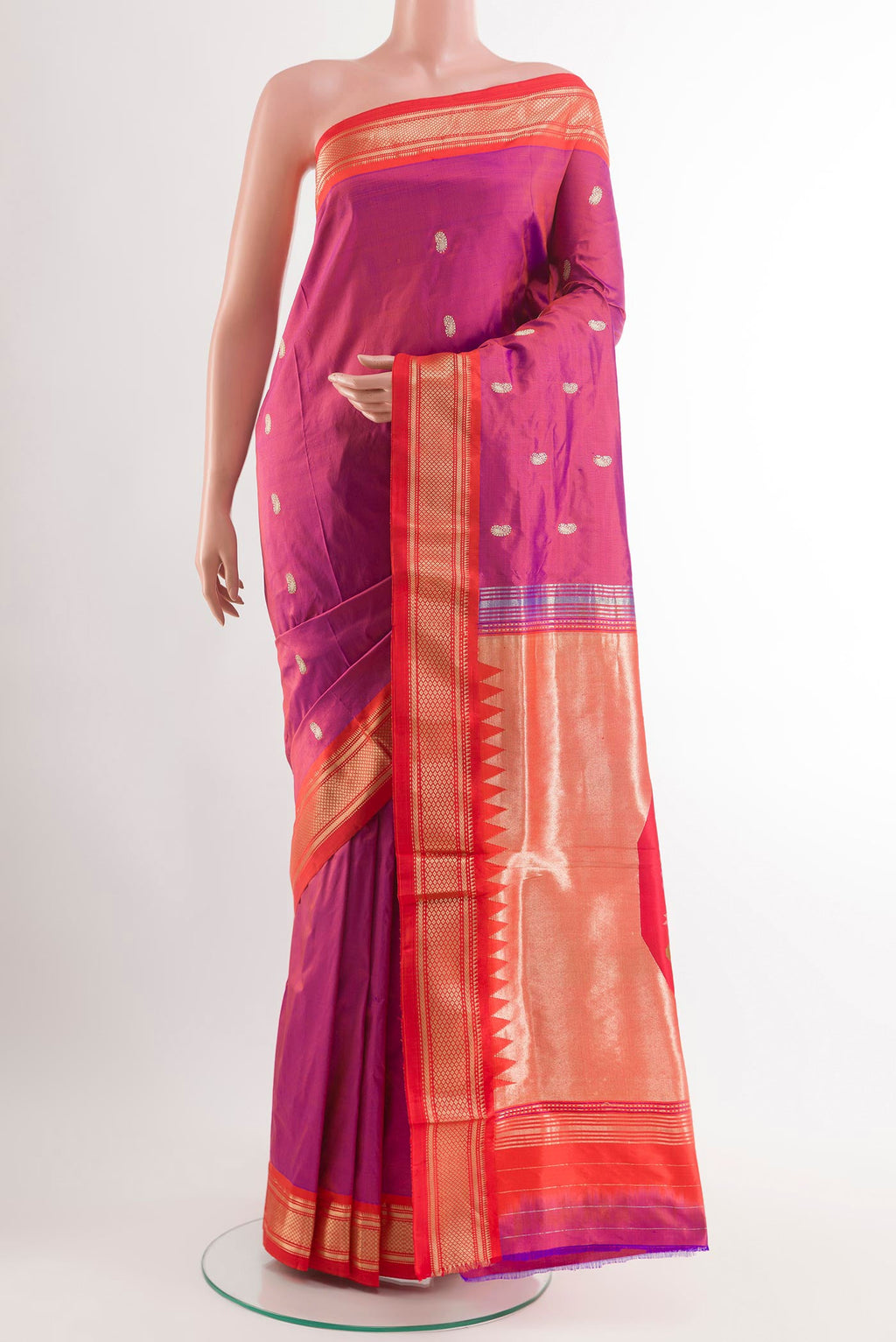 Purple Paithani Silk Saree with Zari Butta on the body and Zari Border.  displayed on a mannequin
