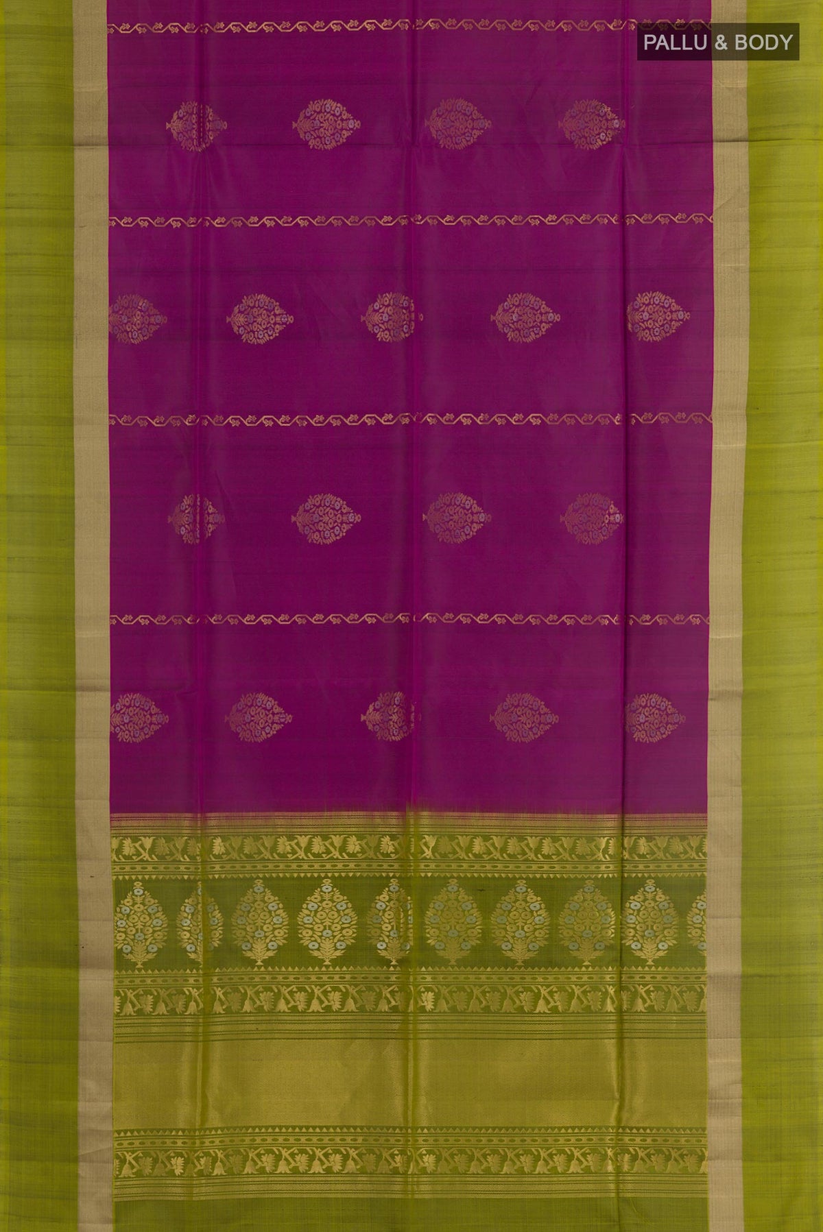 Flat view of Purple Soft Silk Saree with Zari Butta on the body and Zari Border. 