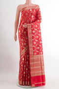 Red Tussar Silk Saree with Zari Brocade on the body and Zari Border.  displayed on a mannequin