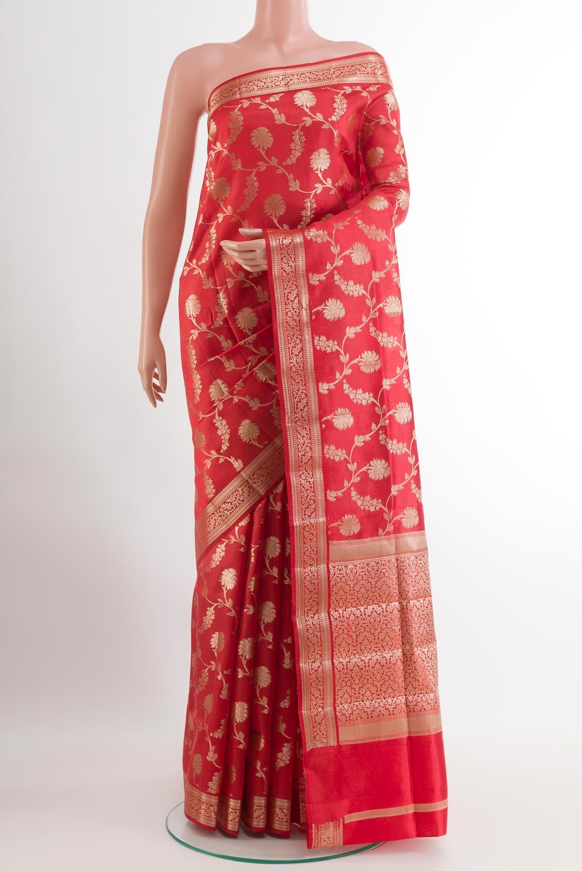 Red Tussar Silk Saree with Zari Brocade on the body and Zari Border.  displayed on a mannequin