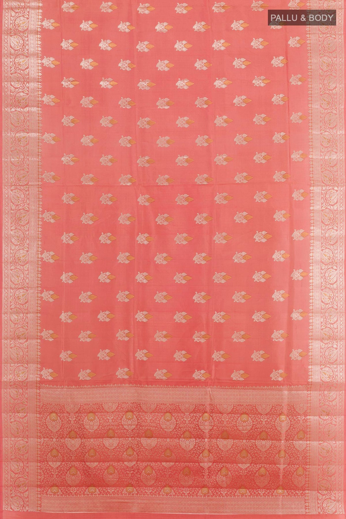 Flat view of Peach Tussar Silk Saree with Zari Butta on the body and Zari Border. 