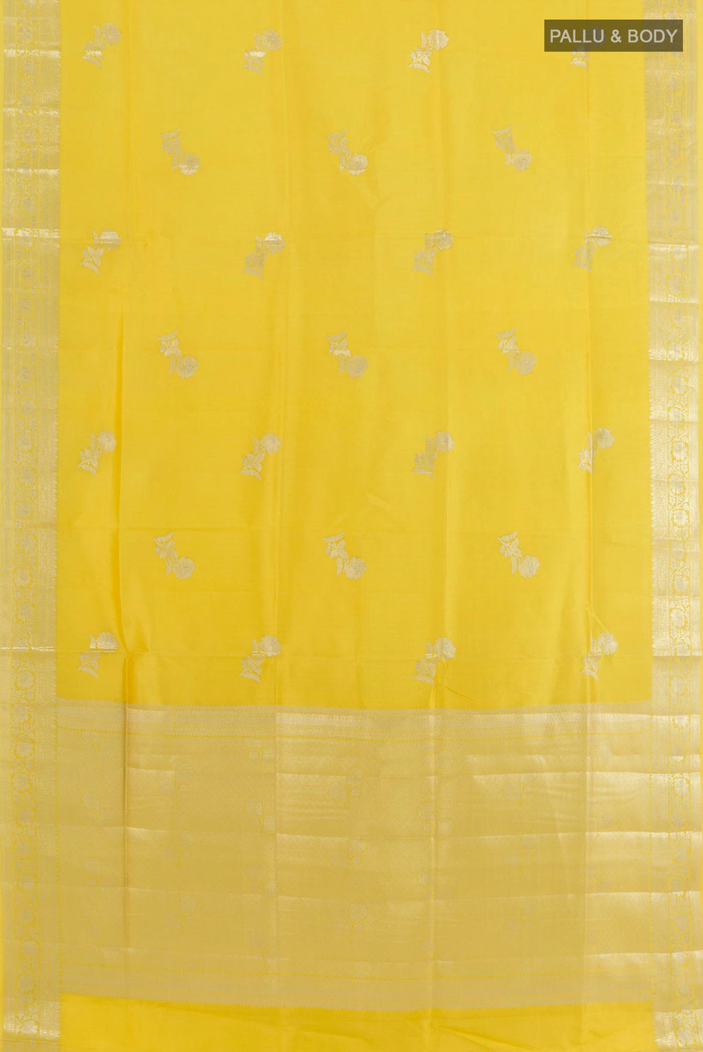 Flat view of Yellow Tussar Silk Saree with Zari Butta on the body and Zari Border. 