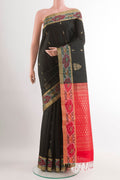 Black Soft Silk Saree with Zari Butta on the body and Zari Border.  displayed on a mannequin