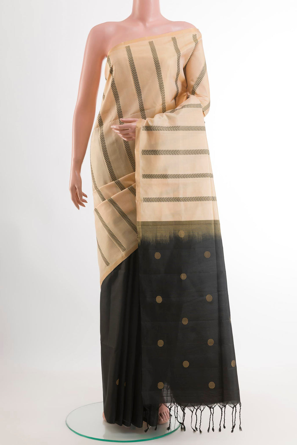 Cream Soft Silk Saree with Stripes on the body and Zari Border.  displayed on a mannequin