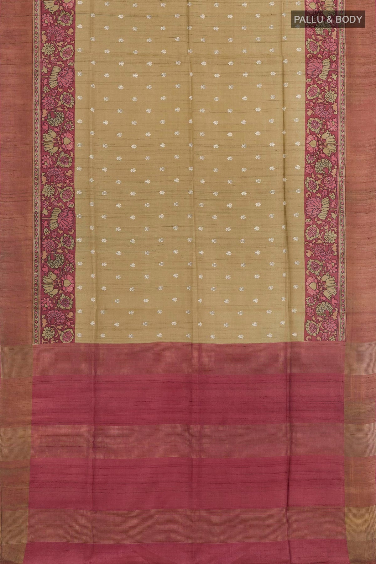 Flat view of Beige Tussar Saree with Thread Butta on the body and Zari Border. 