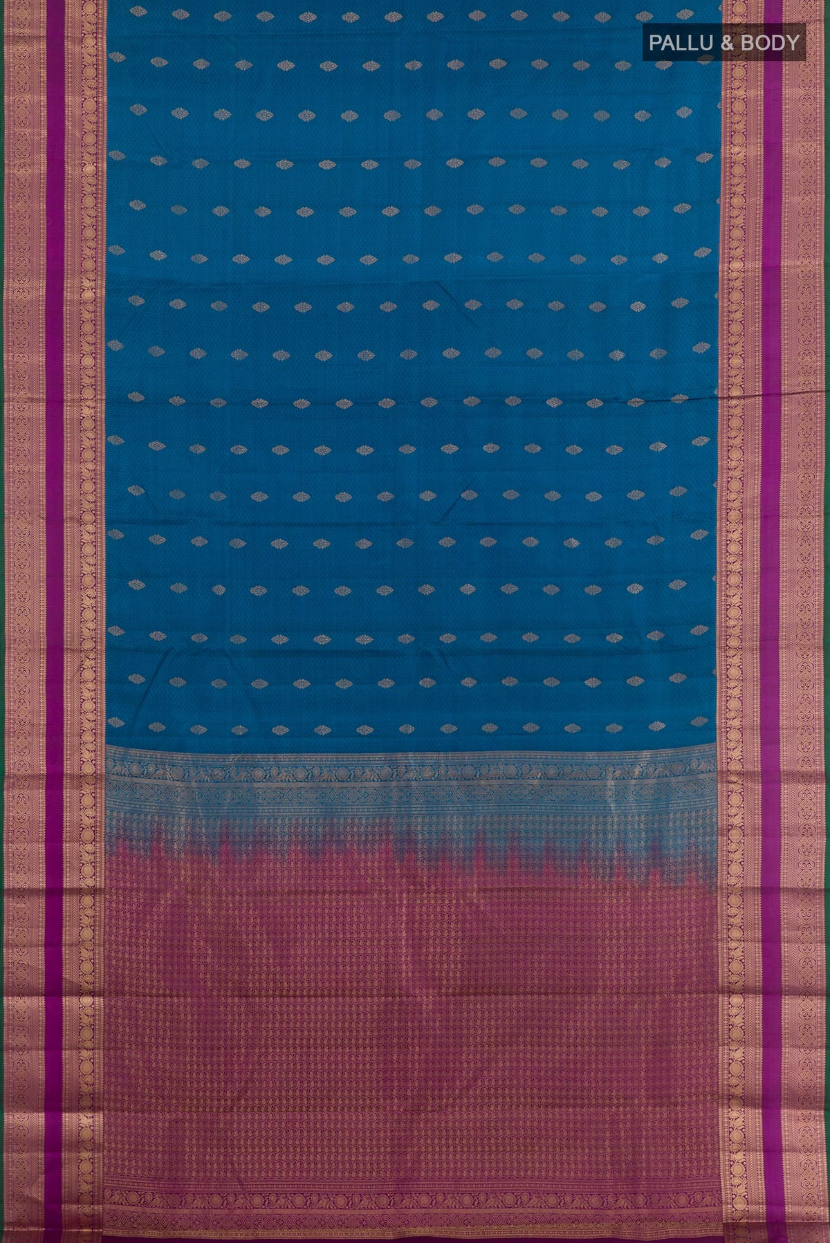 Flat view of Peacock Blue Kanchipuram Silk Saree with Jacquard With Zari Butta on the body and Zari Border. 