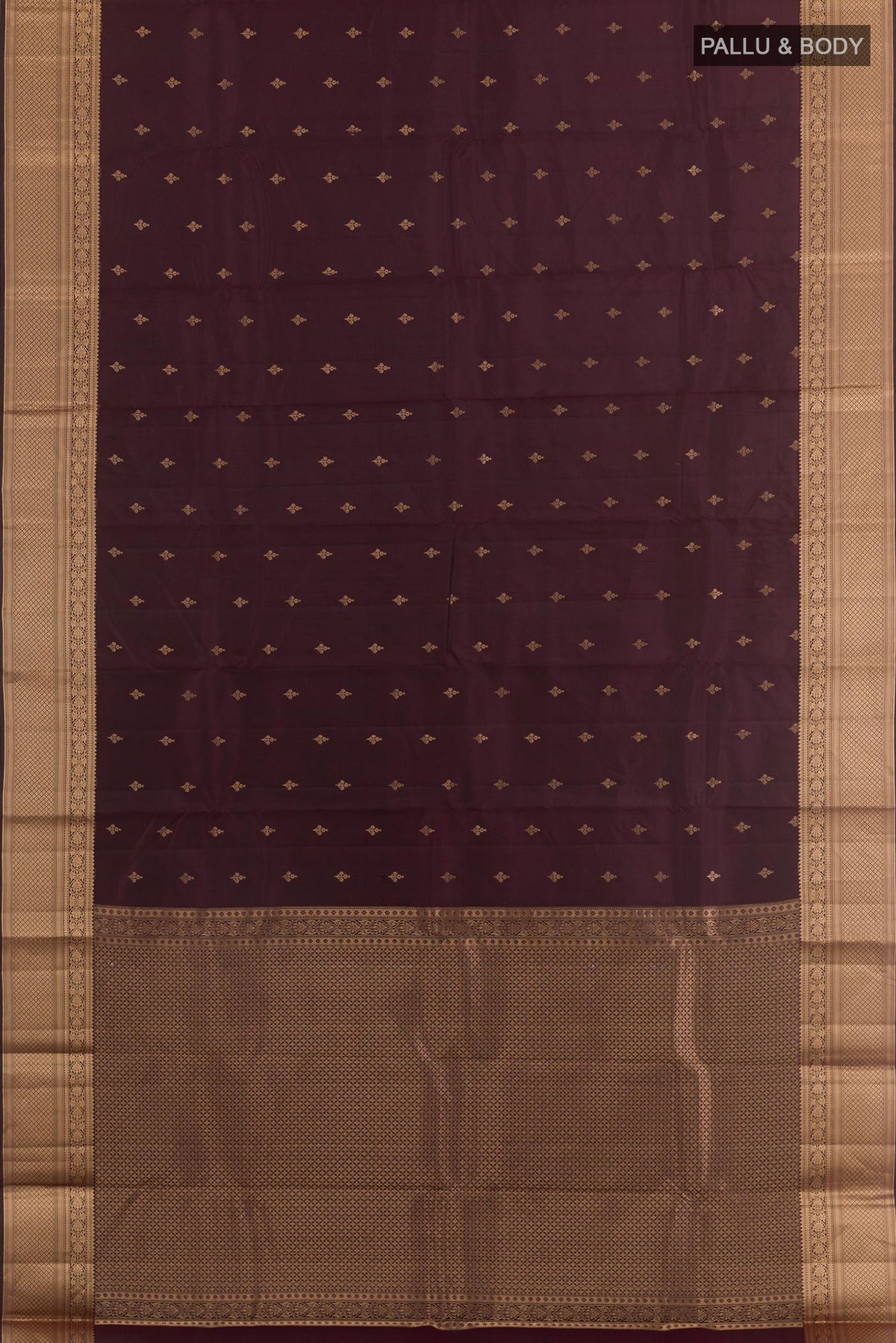 Flat view of Purple Kanchipuram Silk Saree with Zari Butta on the body and Zari Border. 