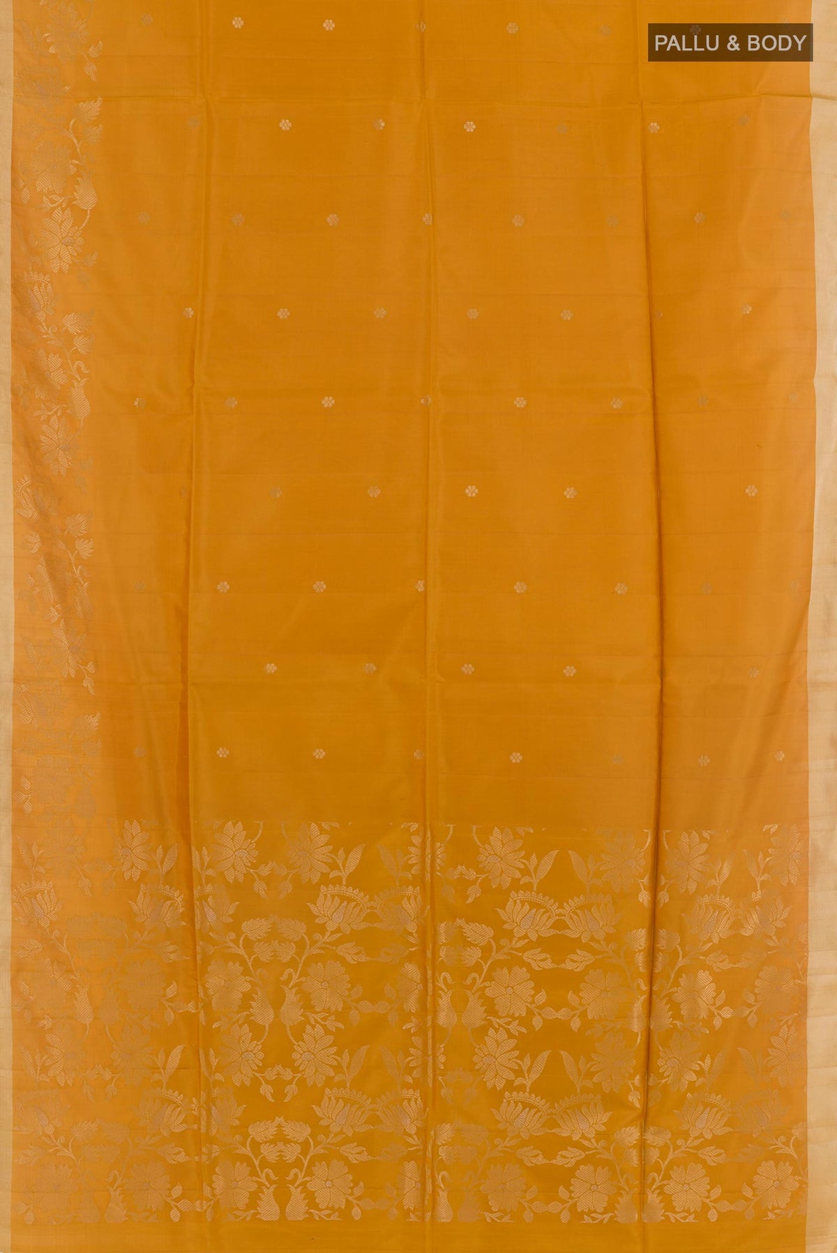Flat view of Yellow Soft Silk Saree with Zari Butta on the body and Zari Border. 