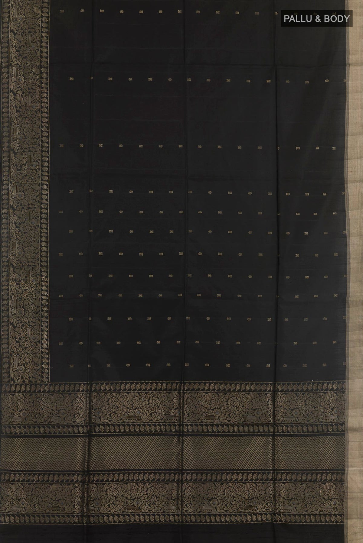 Flat view of Black Soft Silk Saree with Zari Butta on the body and Zari Border. 