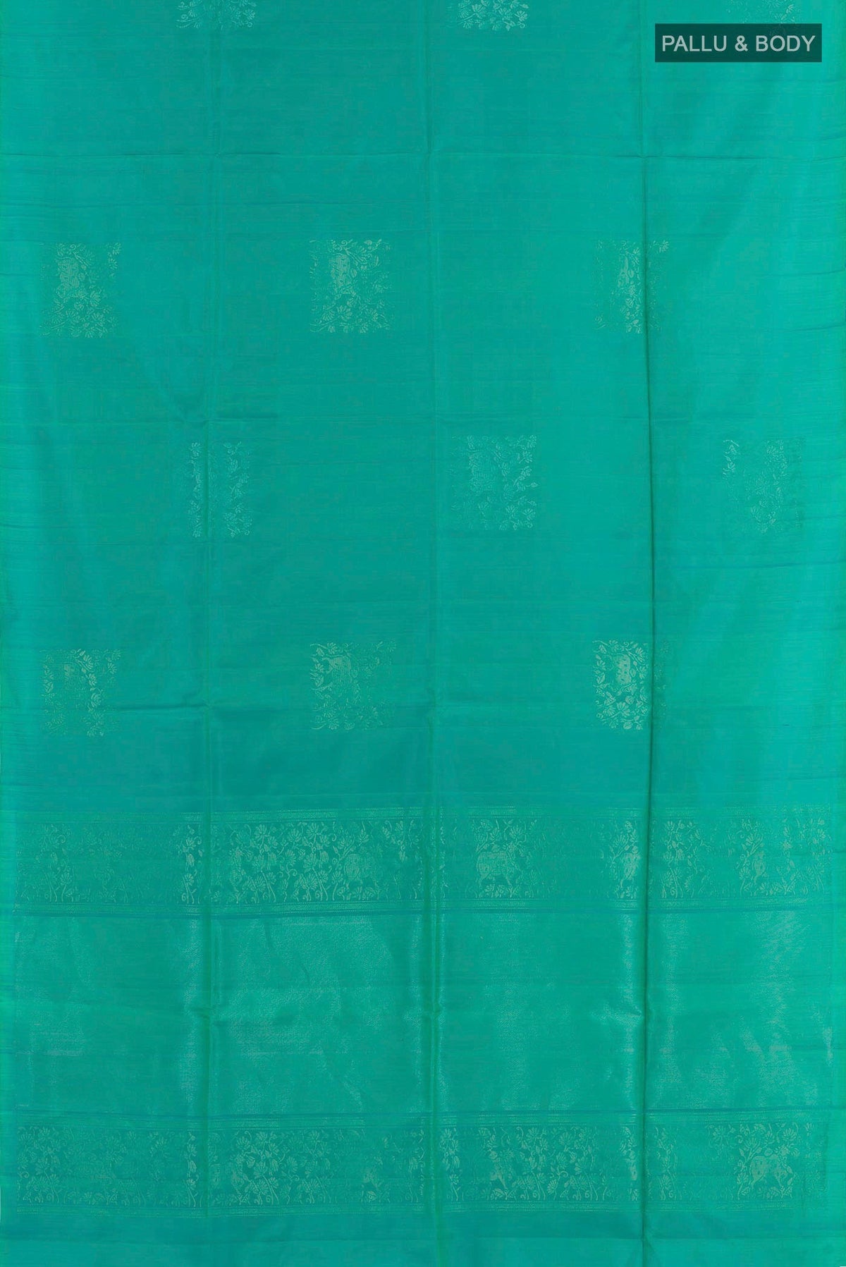 Flat view of Sea Green Soft Silk Saree with Zari Butta on the body and Zari Border. 