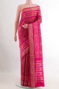Pink Pochampally Silk Saree with Pure Ikat on the body and Zari Border.  displayed on a mannequin
