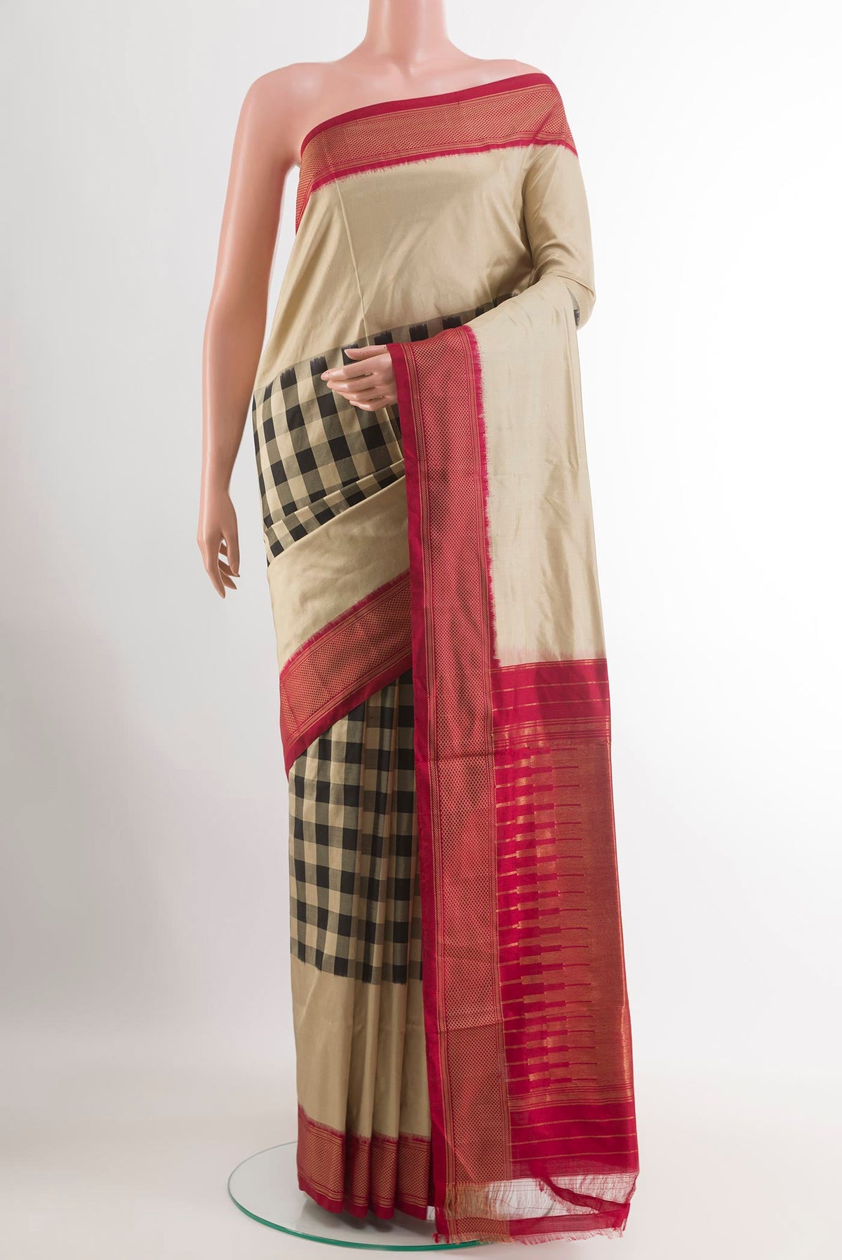 Beige Pochampally Silk Saree with Checked design on the body and Zari Border.  displayed on a mannequin