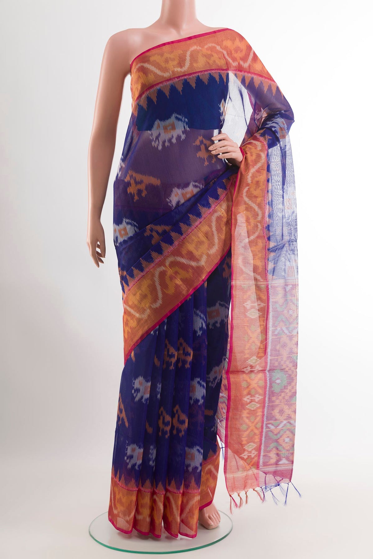 Blue Kora Cotton Saree with Ikat design on the body and Zari Border.  displayed on a mannequin
