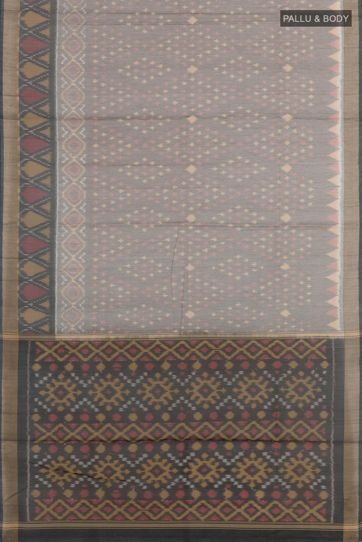 Flat view of Grey Blended Kora Cotton Saree with Ikat design on the body and Zari Border. 