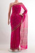 Pink Chiffon Saree with Printed design on the body and Plain Border.  displayed on a mannequin