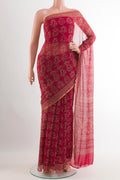 Red Chiffon Saree with Printed design on the body and Plain Border.  displayed on a mannequin