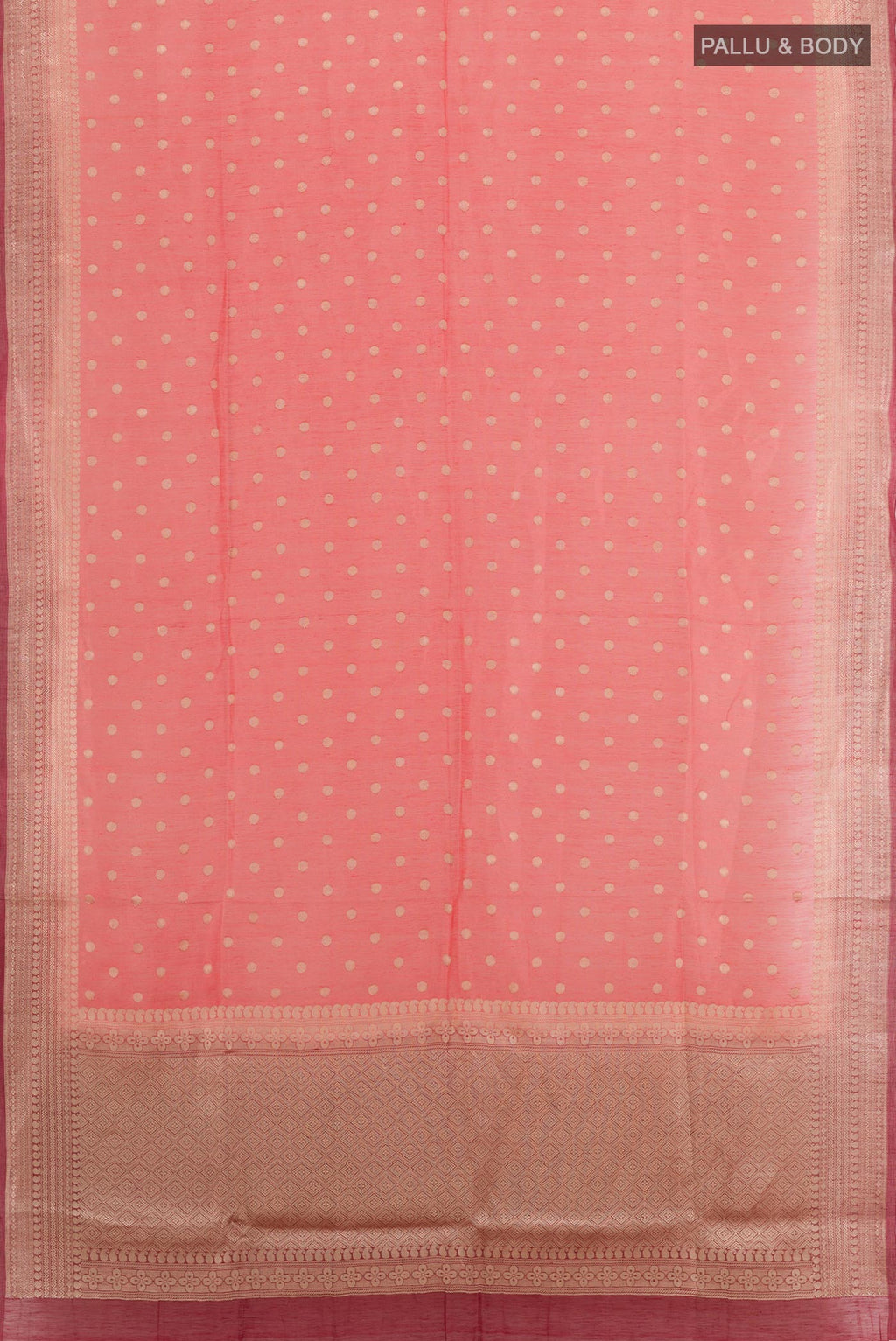 Flat view of Coral Linen Saree with Zari Butta on the body and Zari Border. 