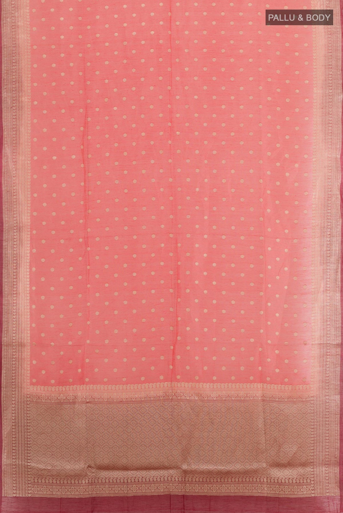 Flat view of Coral Linen Saree with Zari Butta on the body and Zari Border. 