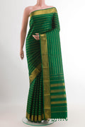 Green Kanchipuram Silk Saree with Stripes on the body and Zari Border.  displayed on a mannequin