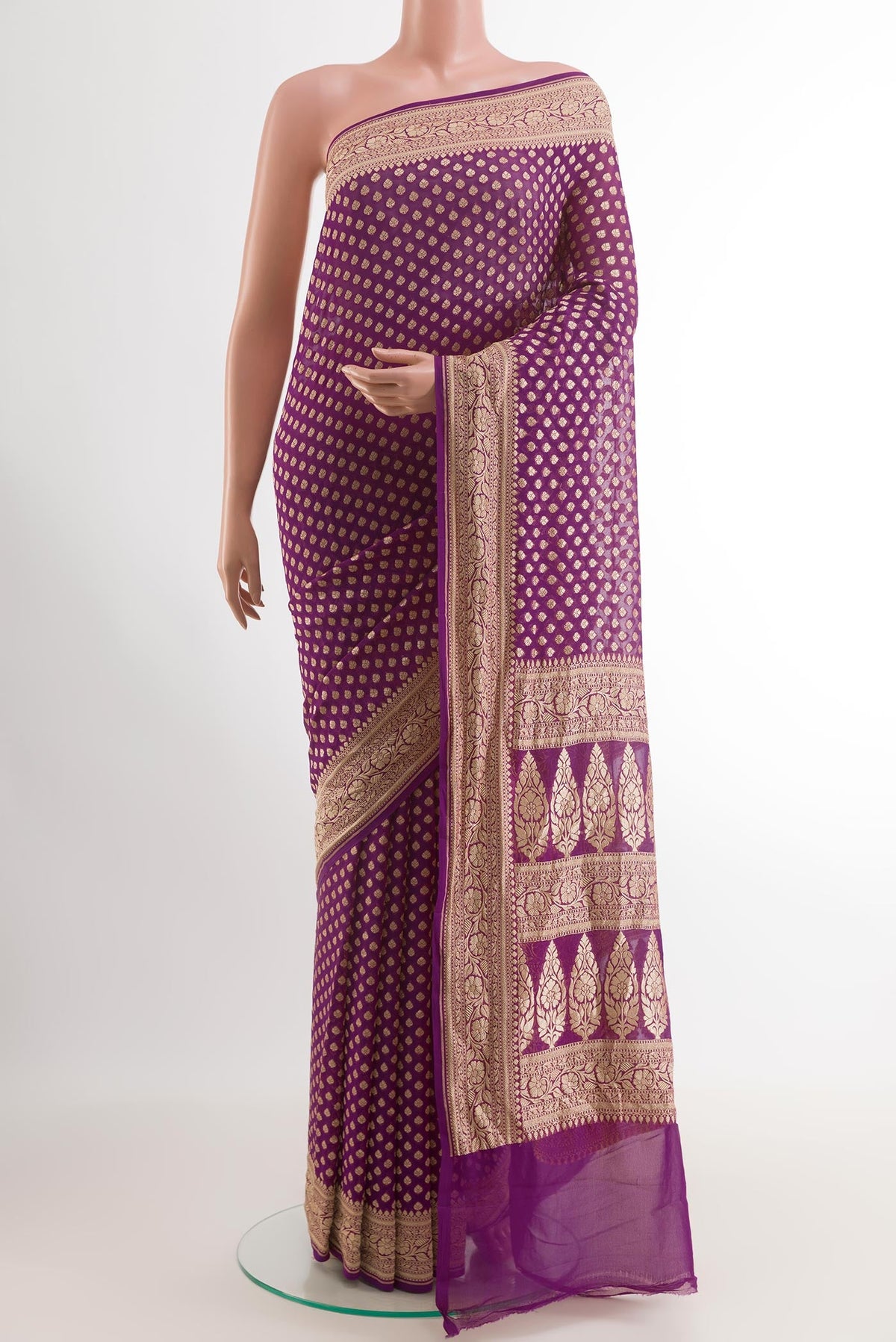 Purple Banarasi Georgette Saree with Zari Butta on the body and Zari Border.  displayed on a mannequin