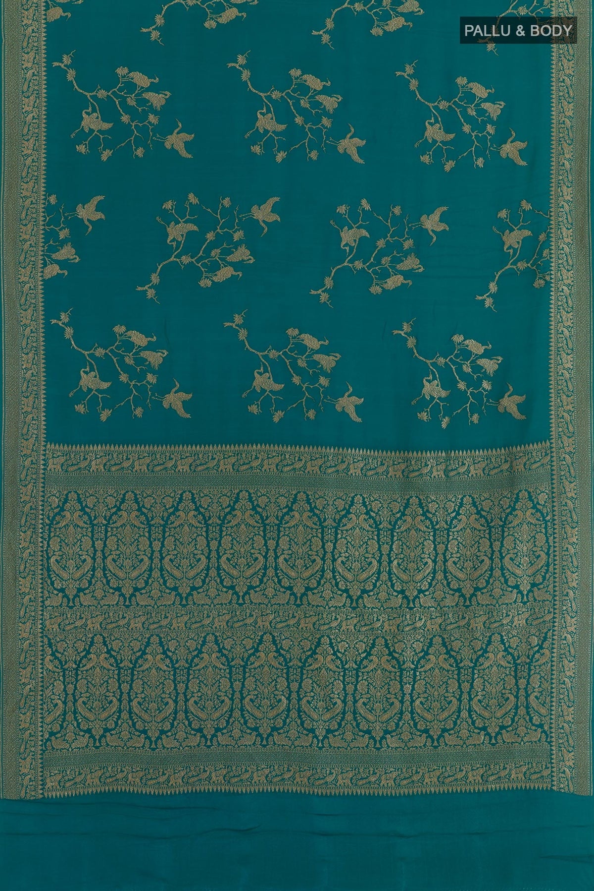 Flat view of Sea Green Banarasi Georgette Saree with Zari Brocade on the body and Thread Border. 