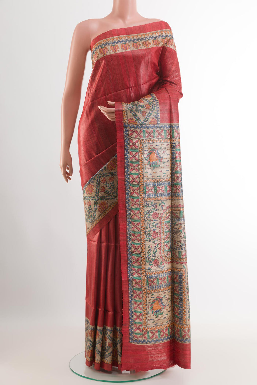Red Tussar Saree with Plain Body and Printed Border.  displayed on a mannequin