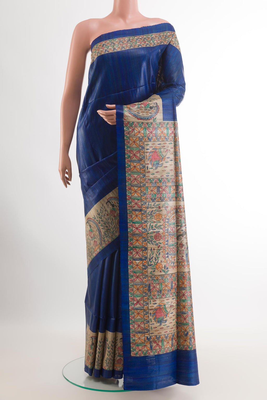 Blue Tussar Silk Saree with Plain Body and Printed Border.  displayed on a mannequin