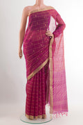Purple Blended Kora Cotton Saree with Checked design on the body and Zari Border.  displayed on a mannequin