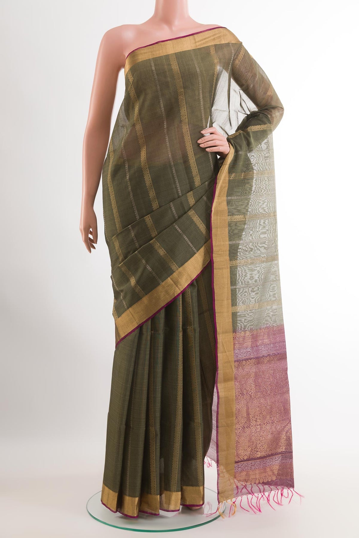 Davys Grey Blended Kora Cotton Saree with Zari Butta on the body and Zari Border.  displayed on a mannequin