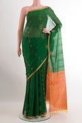 Green Blended Kora Cotton Saree with Zari Butta on the body and Zari Border.  displayed on a mannequin
