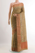 Beige Tussar Saree with Embroidery on the body and Zari Border.  displayed on a mannequin