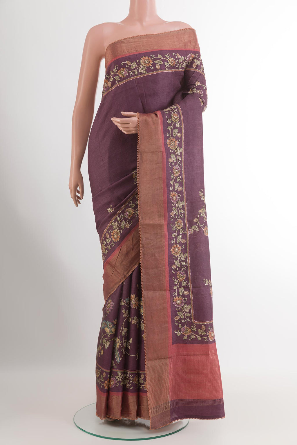 Purple Tussar Silk Saree with Embroidery on the body and Zari Border.  displayed on a mannequin