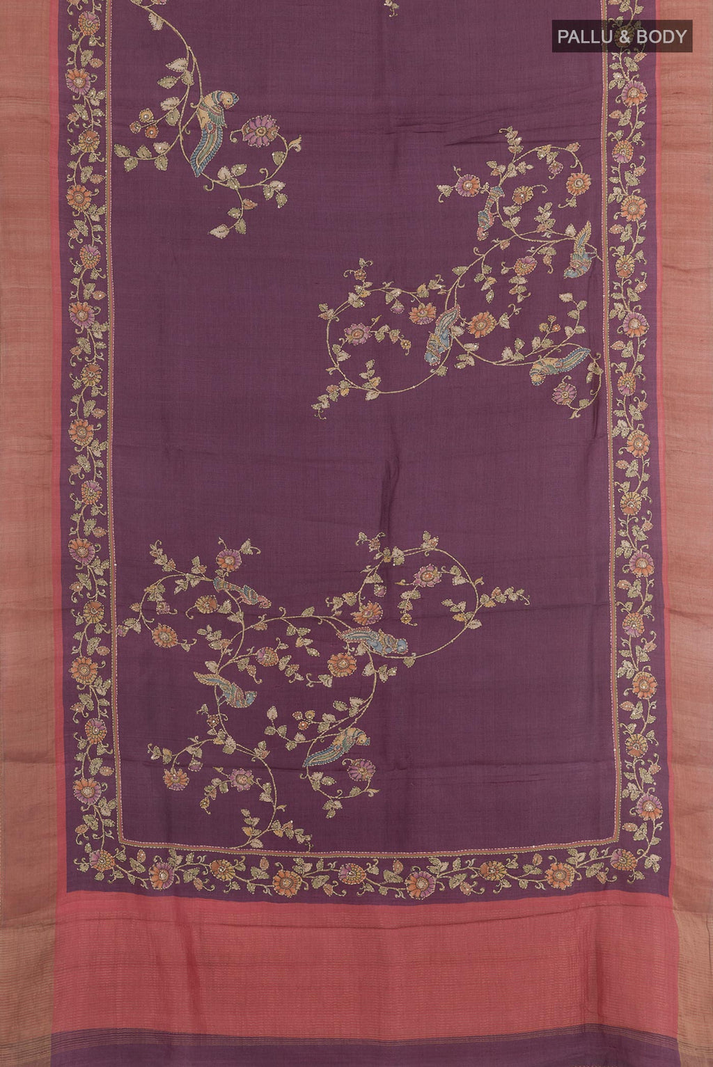 Flat view of Purple Tussar Silk Saree with Embroidery on the body and Zari Border. 