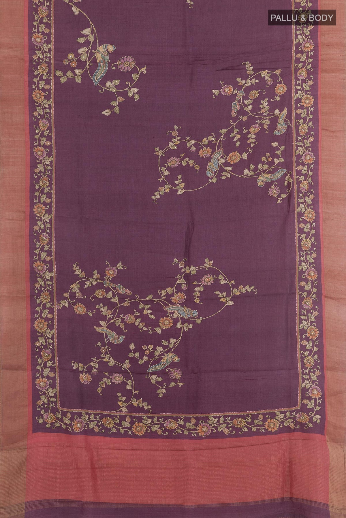 Flat view of Purple Tussar Silk Saree with Embroidery on the body and Zari Border. 