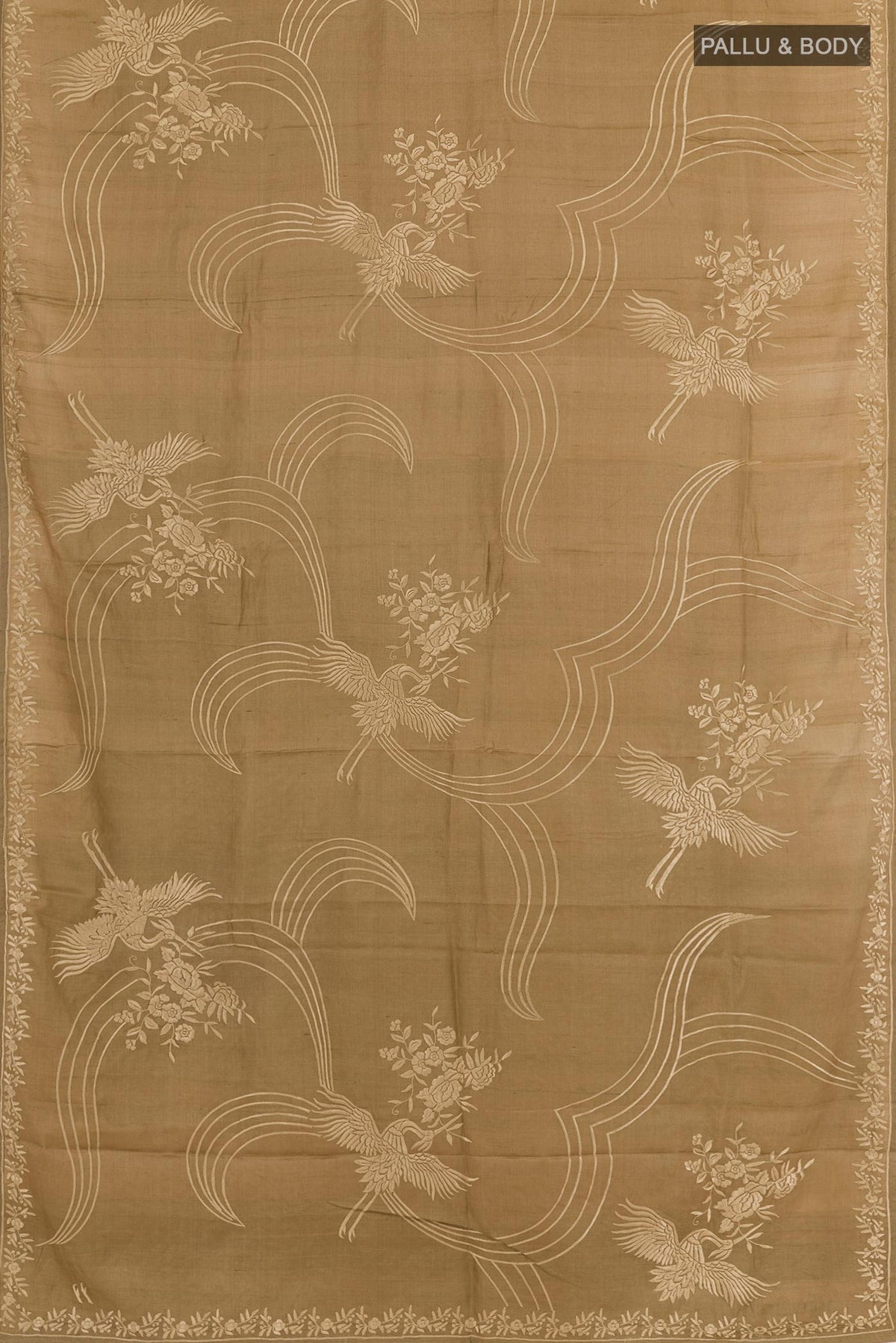 Flat view of Brown Tussar Silk Saree with Embroidery on the body and Embroidery Border. 