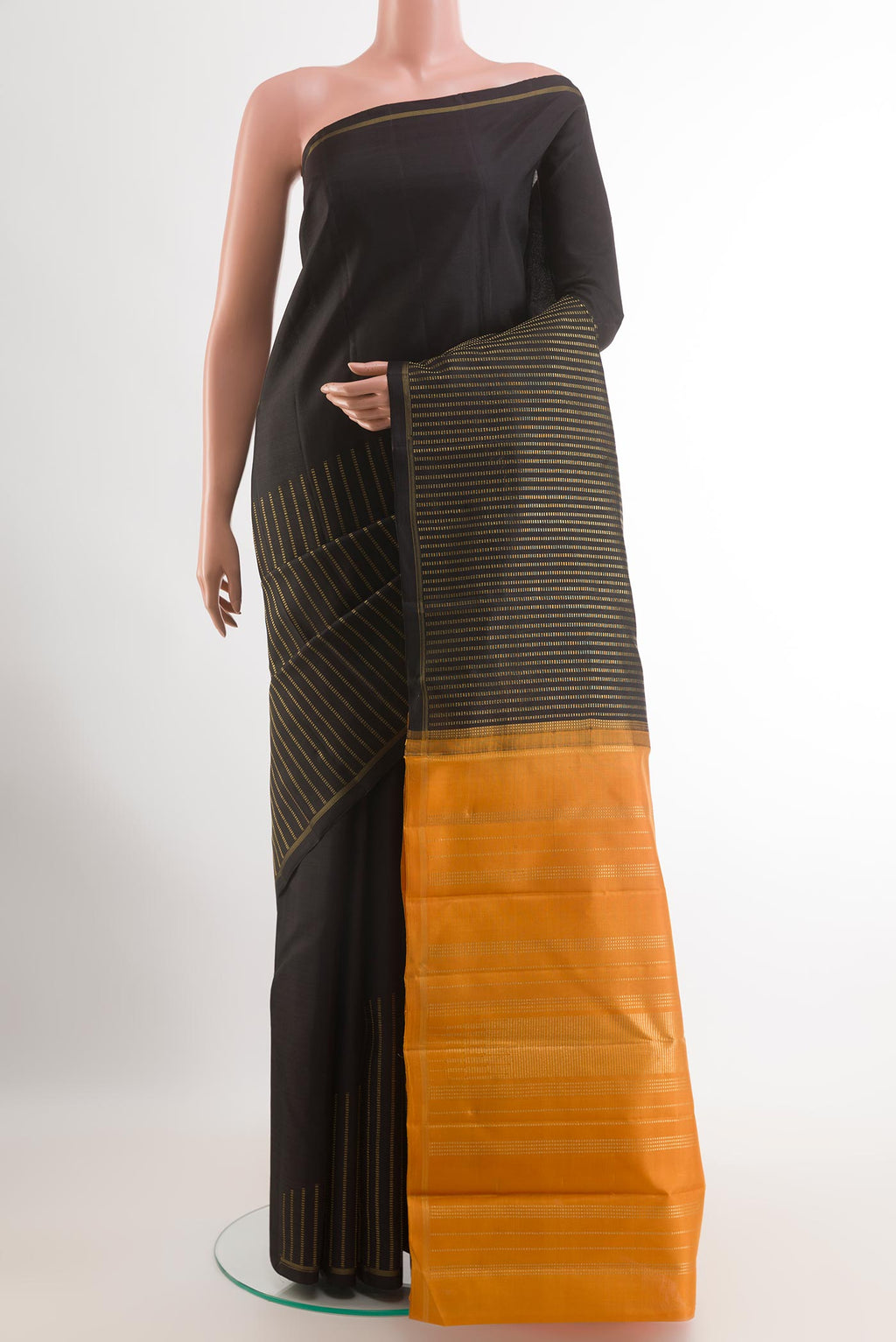Pure Silk Pure Zari Black Kanchipuram Saree with Stripes on the body and Zari Border.  displayed on a mannequin