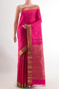 Pure Silk Pure Zari Pink Kanchipuram Saree with Stripes on the body and Zari Border.  displayed on a mannequin