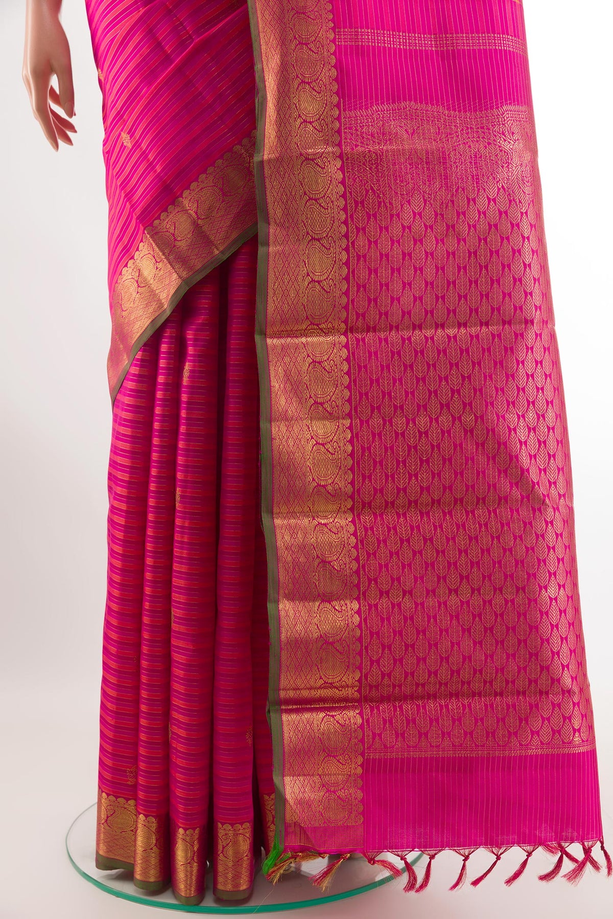 Pleats and pallu of Pure Silk Pure Zari Pink Kanchipuram Saree with Stripes on the body and Zari Border. 