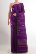 Purple Kanjivaram Silk Saree with Zari Butta on the body and Zari Border.  displayed on a mannequin