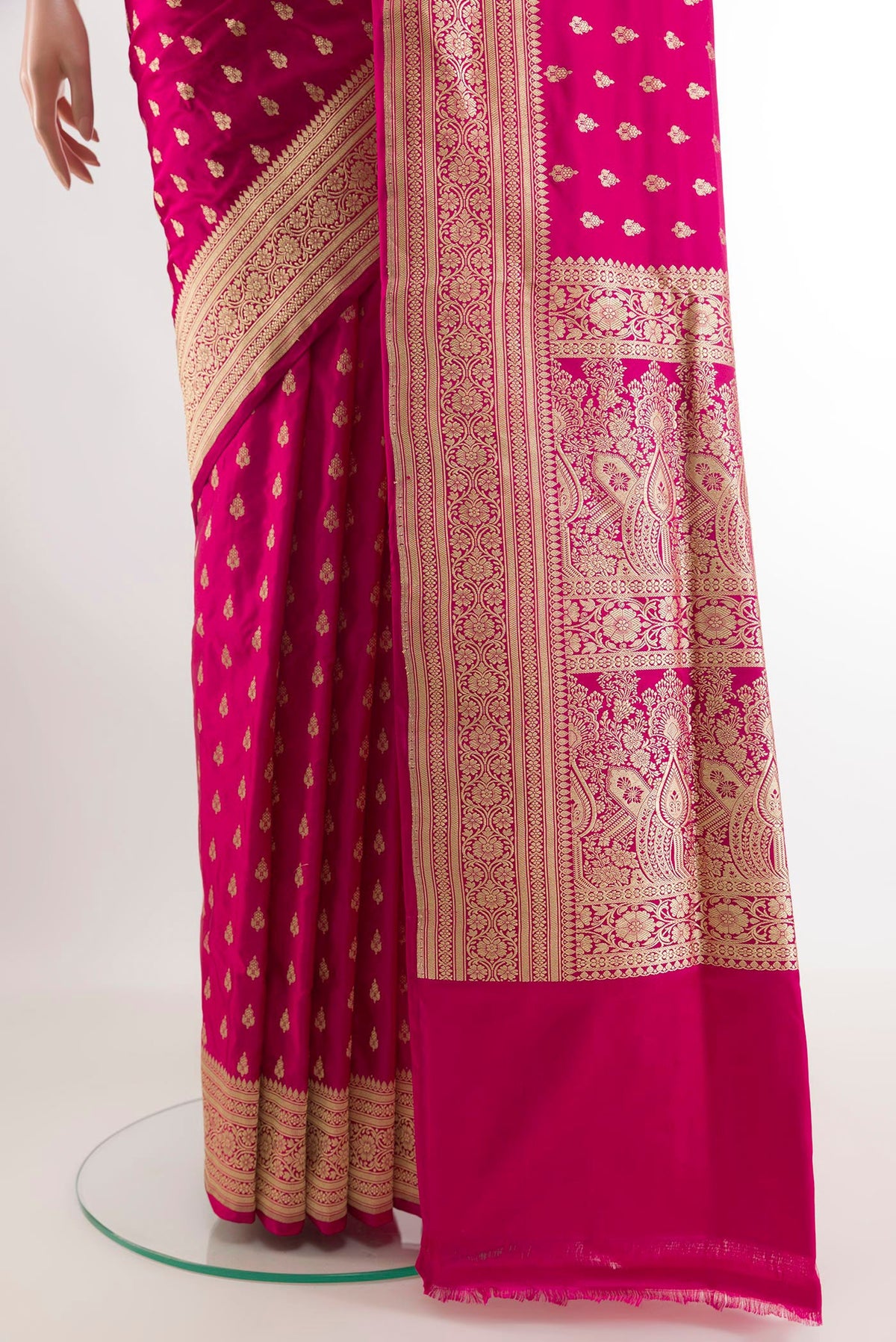 Pleats and pallu of Pink Banarasi Silk Saree with Zari Butta on the body and Zari Border. 