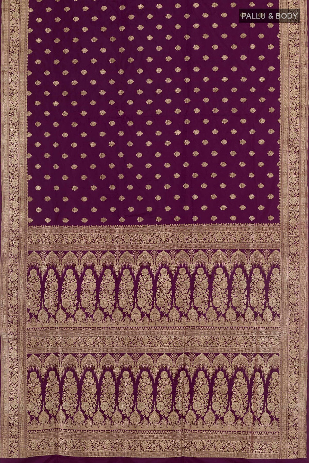 Flat view of Purple Banarasi Silk Saree with Zari Butta on the body and Zari Border. 