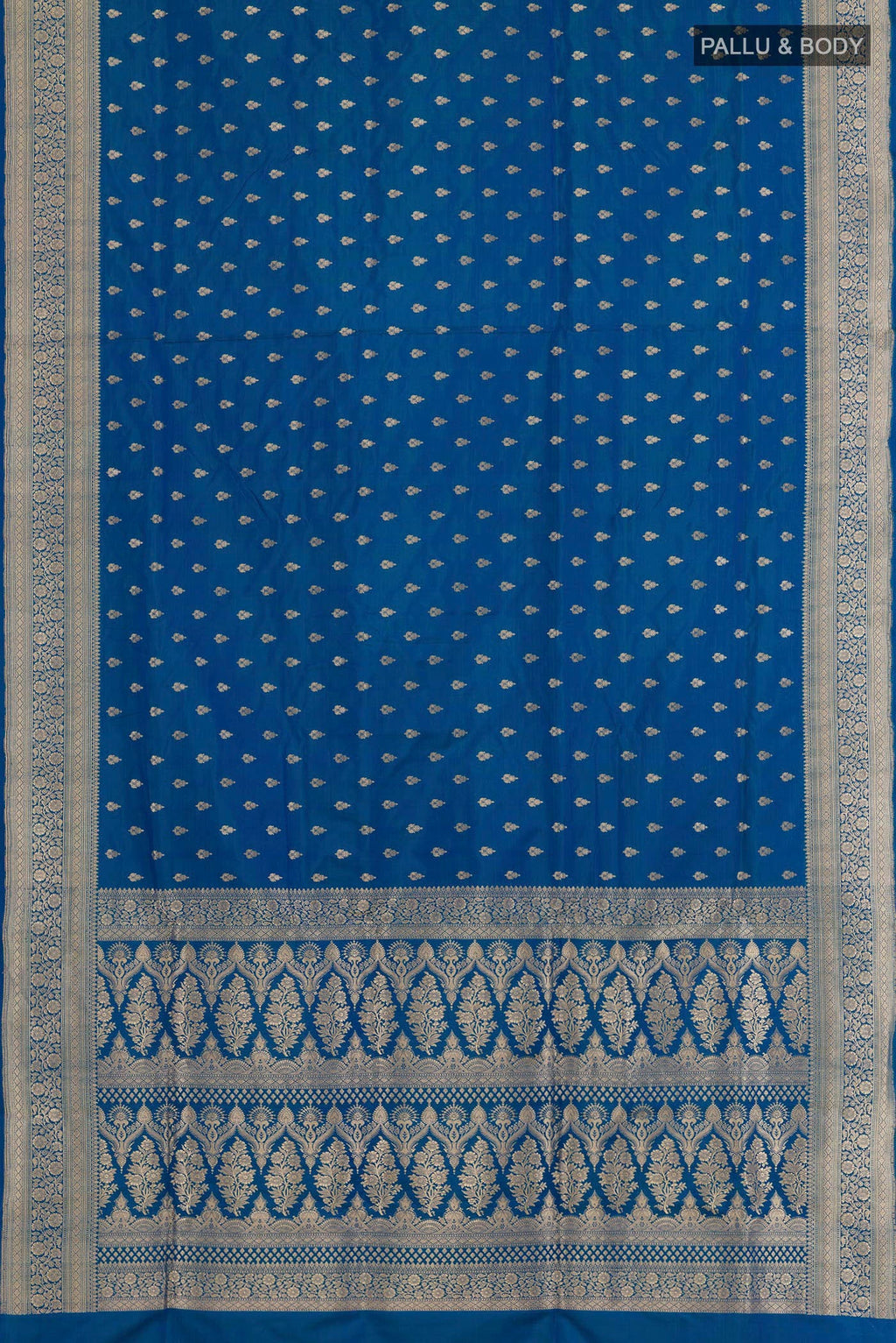 Flat view of Blue Banarasi Silk Saree with Zari Butta on the body and Zari Border. 