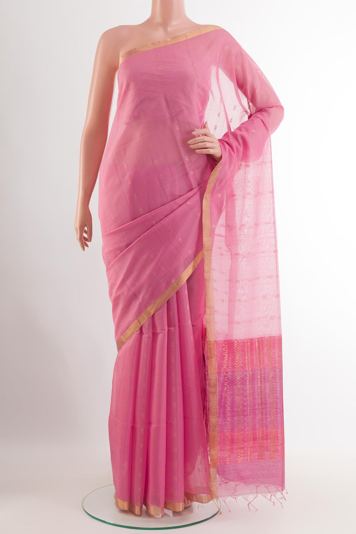 Pink Blended Kora Cotton Saree with Zari Butta on the body and Zari Border.  displayed on a mannequin
