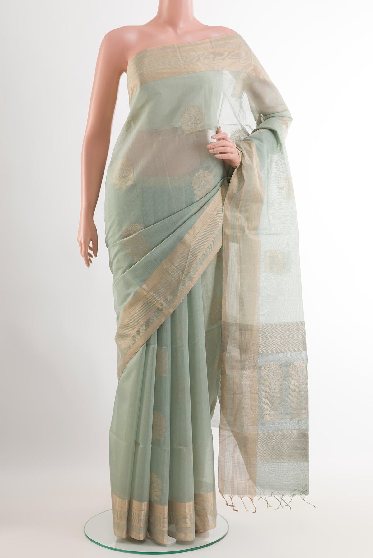 Grey Chiffon Saree with Printed design on the body and Plain Border.  displayed on a mannequin
