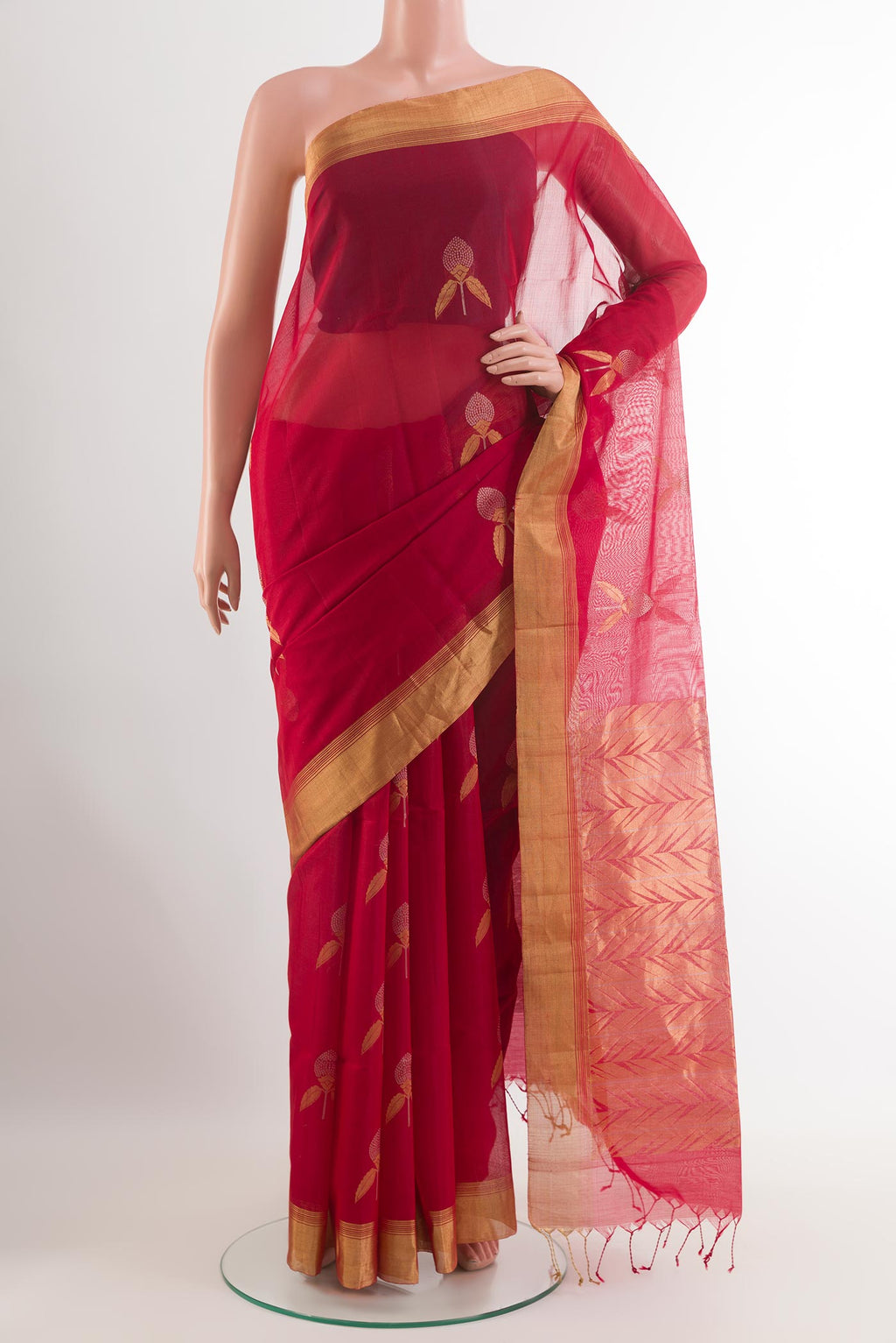 Red Blended Kora Cotton Saree with Zari Butta on the body and Zari Border.  displayed on a mannequin