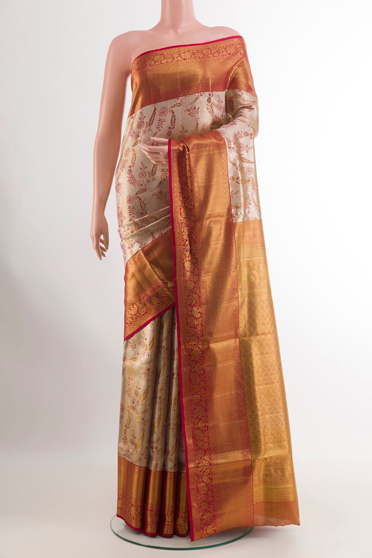 Silver Dual Tone Kanjivaram Tissue Silk Saree with Zari Brocade on the body and Zari Border.  displayed on a mannequin