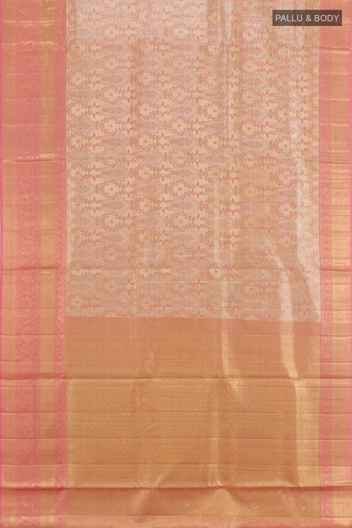 Flat view of Rose Gold Kanjivaram Tissue Silk Saree with Zari Brocade on the body and Zari Border. 