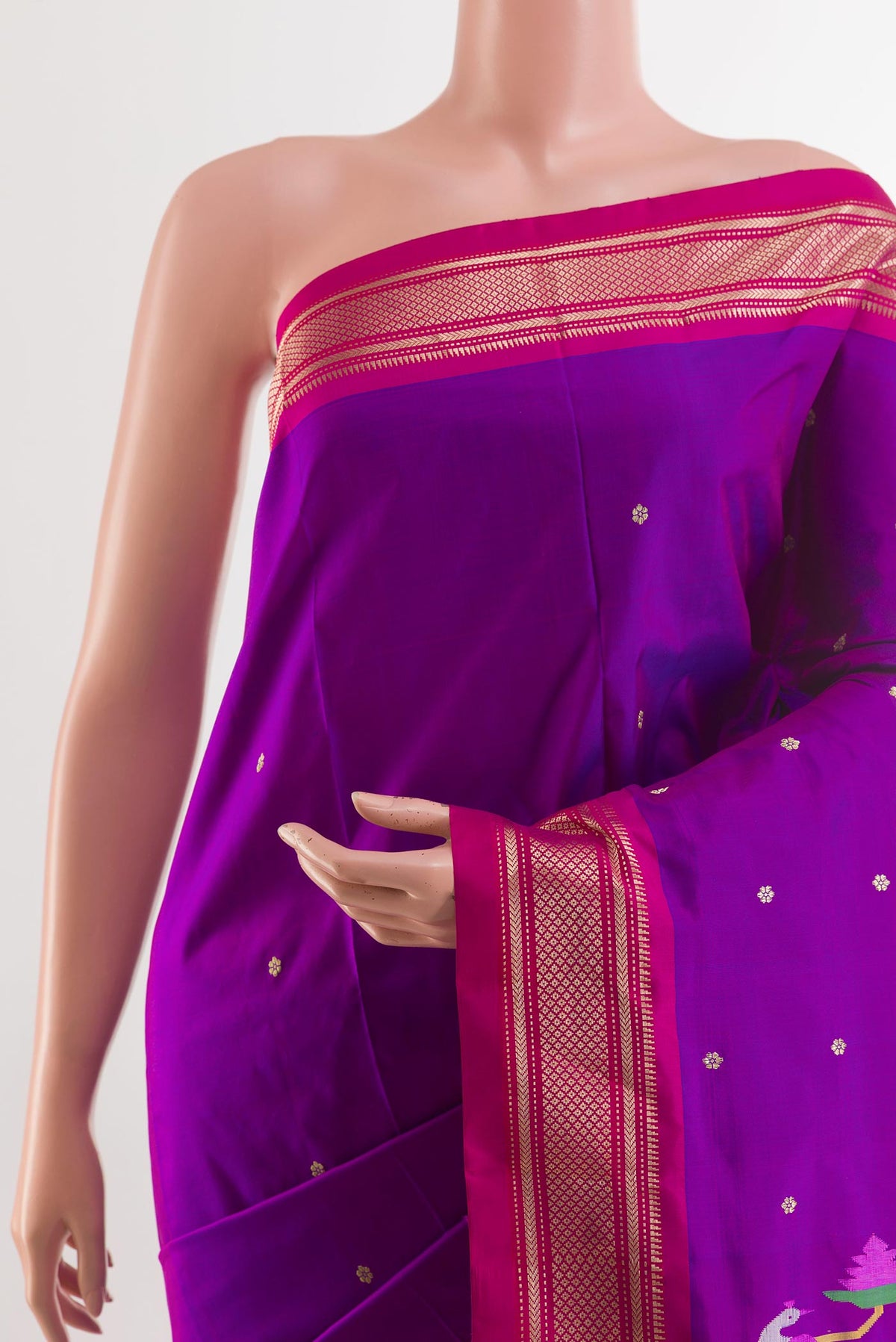 Border image of Purple Paithani Silk Saree with Zari Butta on the body and Zari Border. 