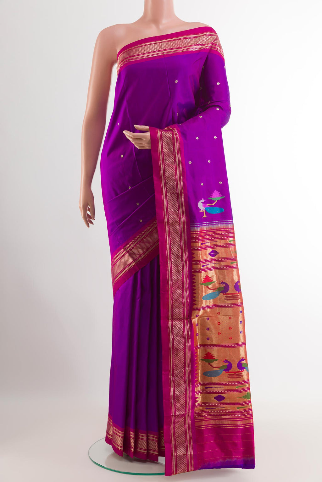 Purple Paithani Silk Saree with Zari Butta on the body and Zari Border.  displayed on a mannequin
